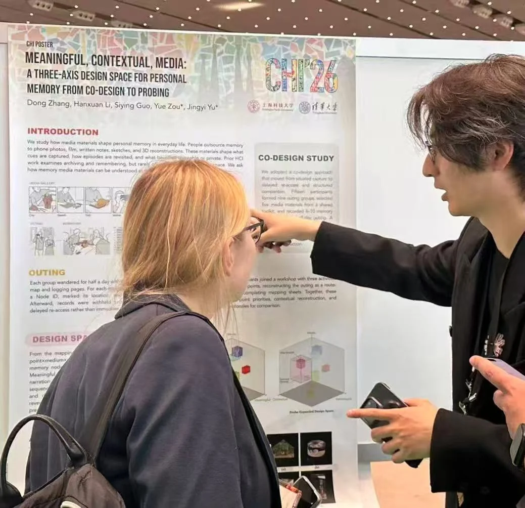 Dong Zhang discussing the Mediated Memory poster at CHI 2026