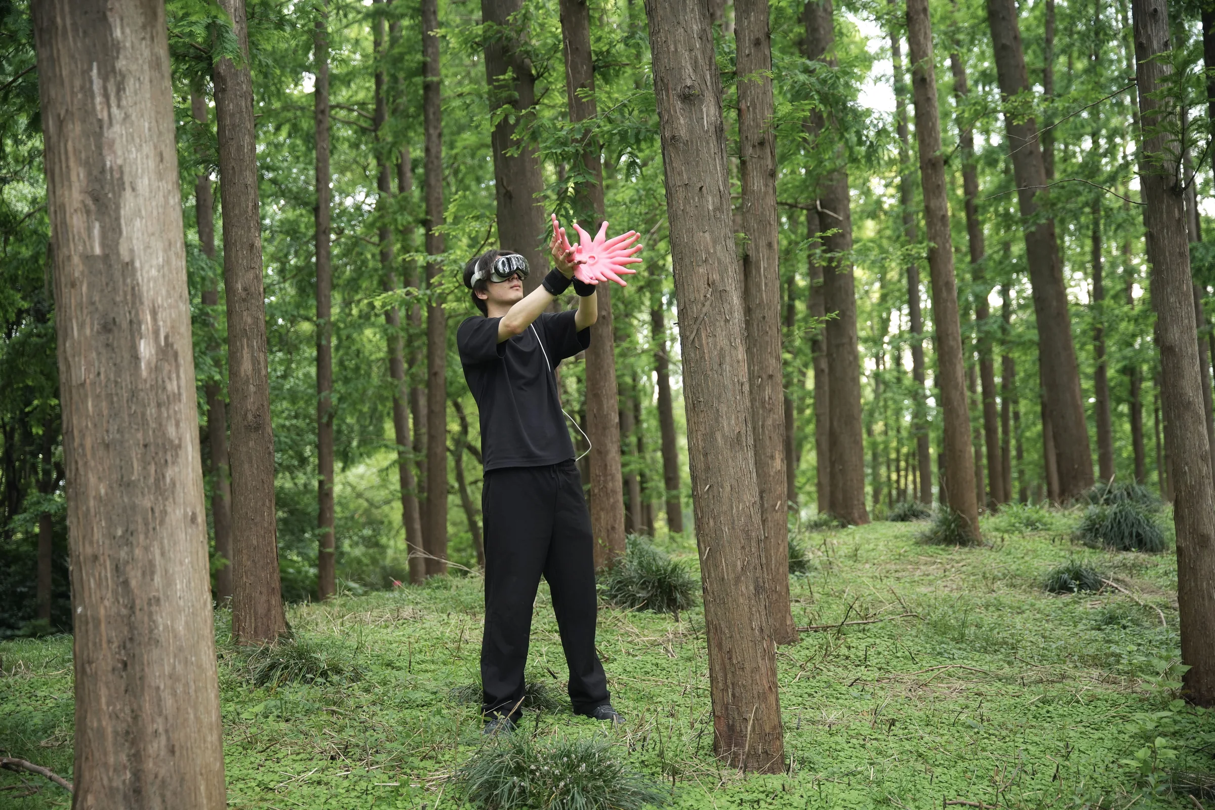A participant experiencing FeltSight in a forest