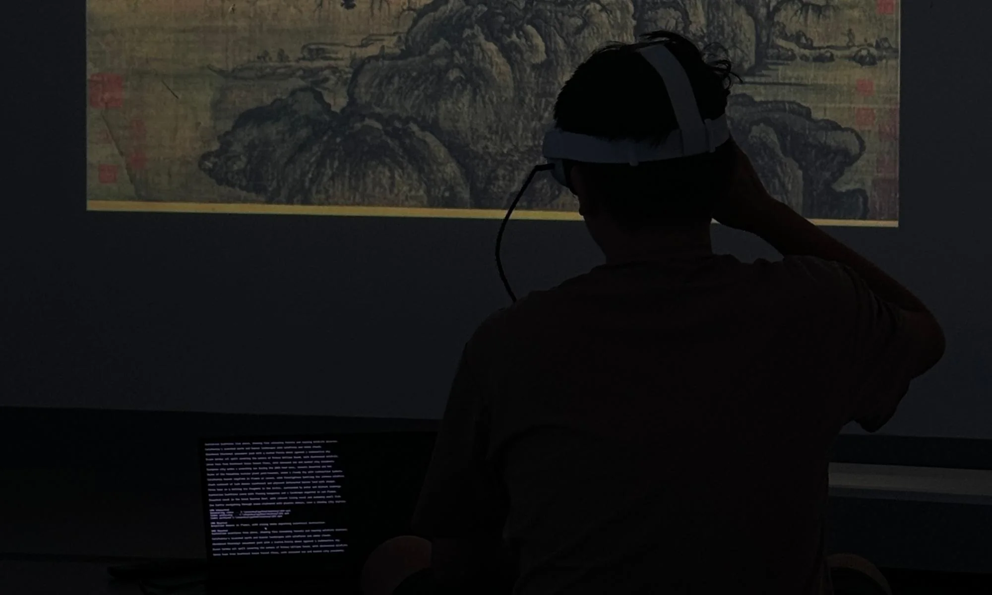Visitor experiencing Negative Shanshui with a headset