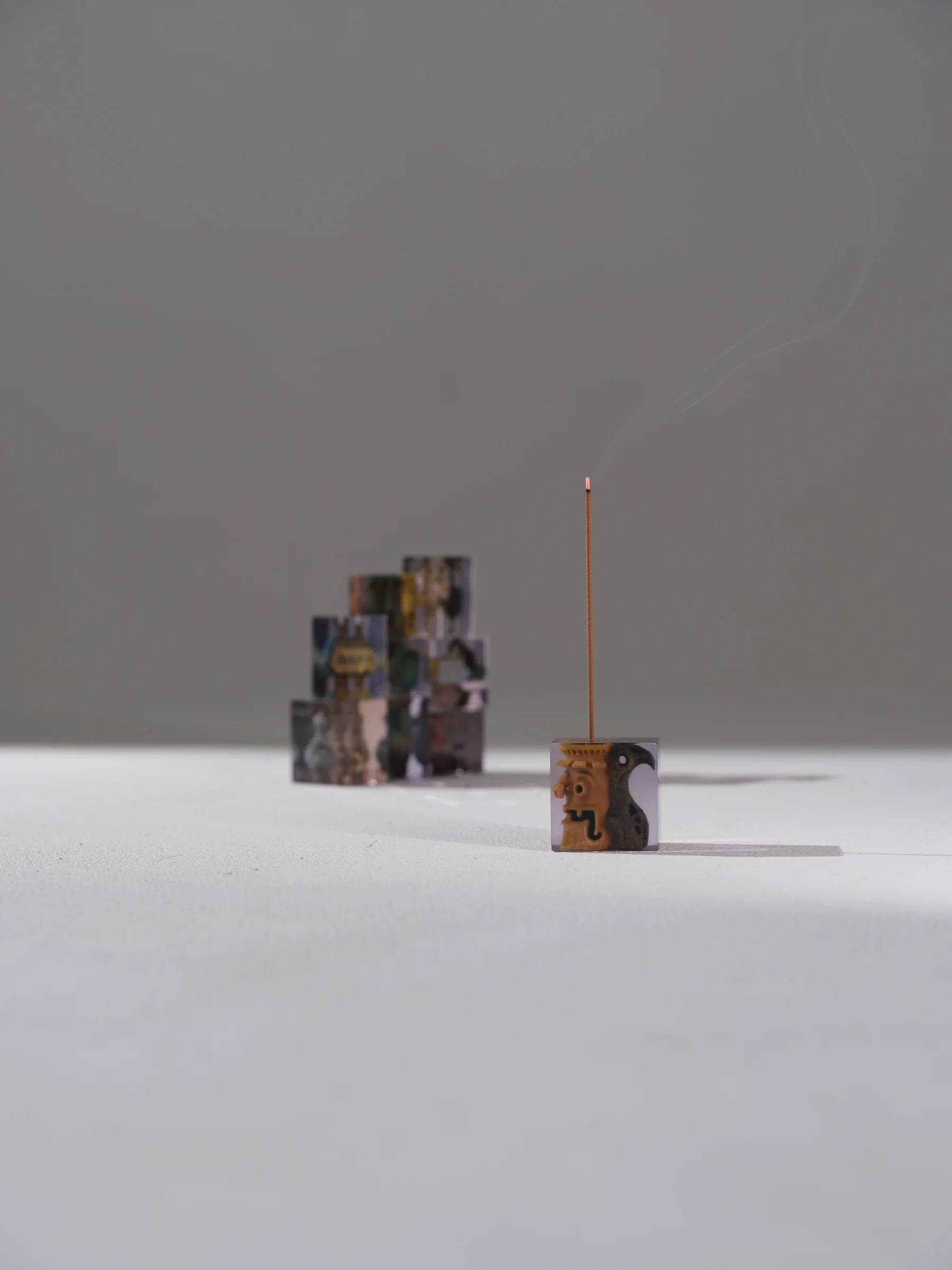 Paired Syncret objects arranged on a white surface